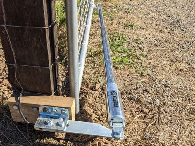 Farm gate solar opener